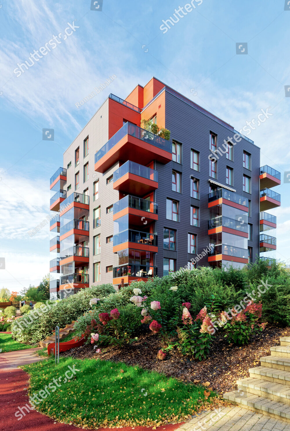 stock-photo-modern-glass-apartment-residential-building-and-outdoor-facilities-633435017